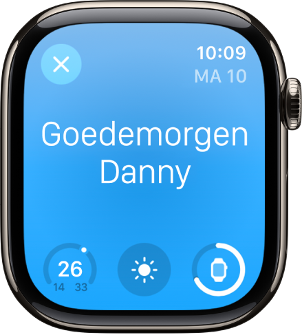 Apple Watch met het scherm dat wordt weergegeven als je wakker wordt. Bovenin staat de tekst 'Goedemorgen'. Onderin staan de temperatuur, de weersomstandigheden en het batterijniveau.