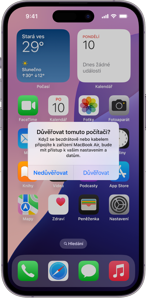 iPad s dialogovým oknem „Důvěřovat tomuto počítači?“, které se zobrazí při prvním připojení k MacBooku Air.
