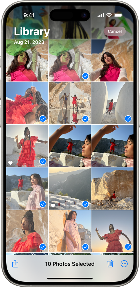 The iPhone screen is filled with a grid of photos, some of which are selected. At the bottom of the screen are the Share, Delete, and More buttons.