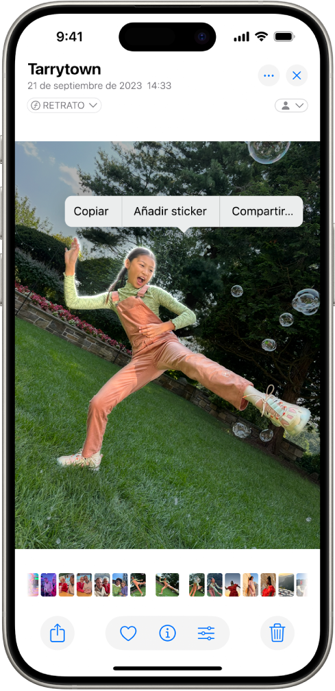 La app Fotos abierta en la foto de una persona. La persona está seleccionada y la opción “Añadir sticker” está disponible en el menú de arriba.