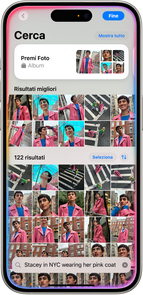 Su iPhone vengono visualizzate foto nell’app Foto. Nella parte inferiore della schermata è presente una barra di ricerca con una descrizione.