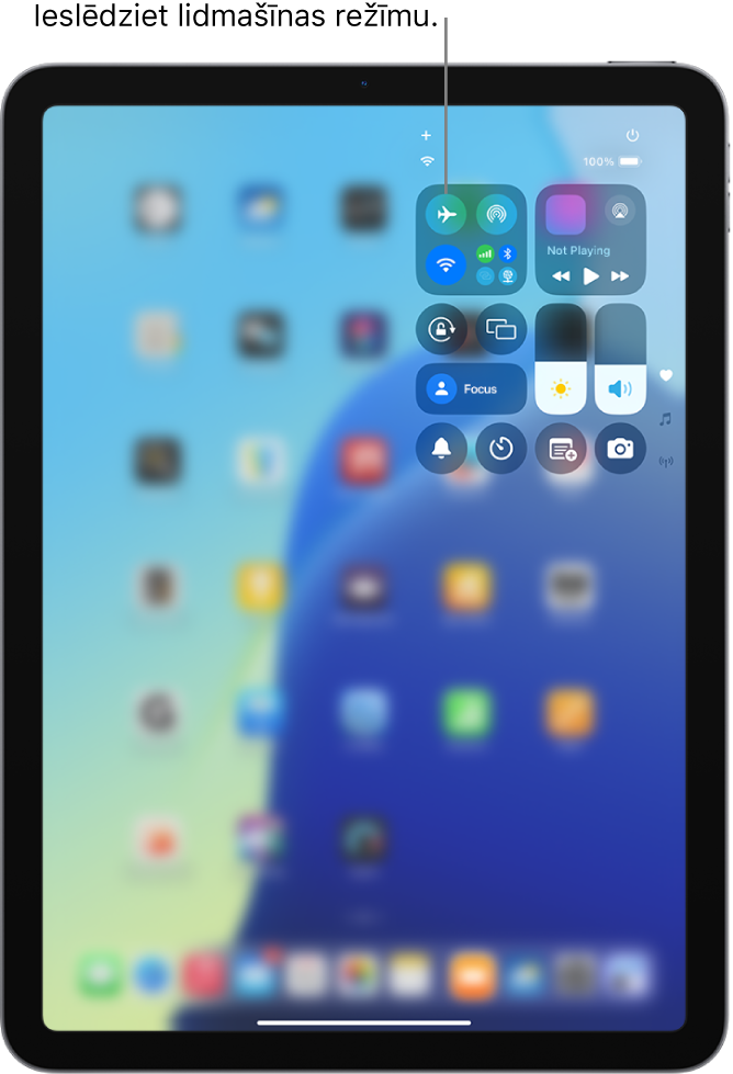 Izvēlnes Control Center ekrāns, kurā norādīts, ka pieskāriens augšējai pogai pa kreisi ieslēdz lidmašīnas režīmu.