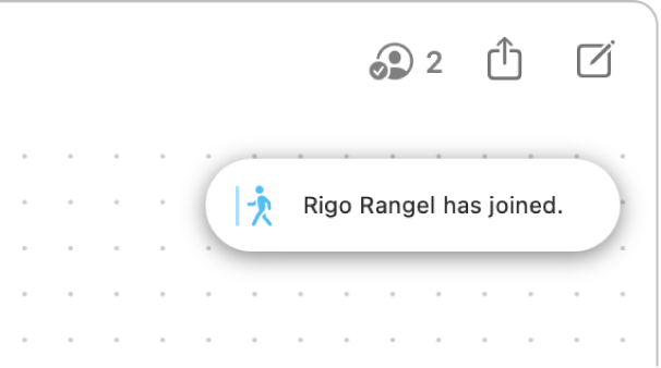 Le coin supérieur droit d’un tableau Freeform. La notification indique qu’un participant s’est joint au tableau.