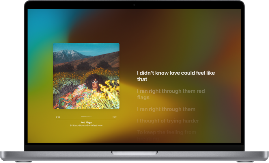 Le lecteur plein écran avec une chanson en lecture et les paroles à droite, qui s’affichent à l’écran en synchronisation avec la musique.