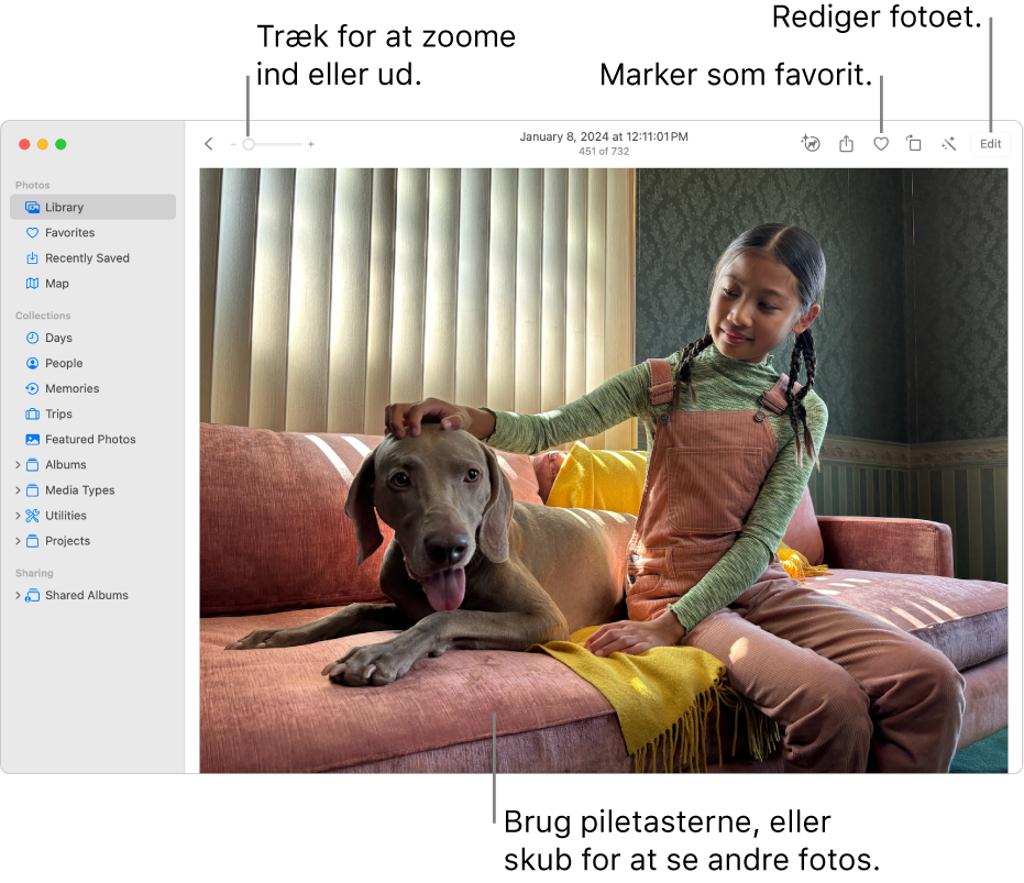 I vinduet Fotos vises et forstørret foto til højre. Værktøjslinjen øverst omfatter zoommærket, knappen Favorit og knappen Rediger.