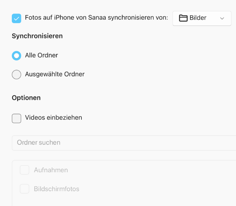 Die Optionstasten „Alle Fotos und Alben“ und „Ausgewählte Alben“ werden angezeigt, darunter befinden sich die Felder „Nur Favoriten“, „Videos einbeziehen“ und „Fotos automatisch einbeziehen von:“.