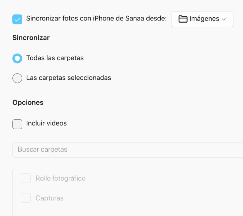 Se muestran las opciones Todas las fotos y álbumes y Los álbumes seleccionados, y debajo de estas están las casillas Sólo favoritos, Incluir videos, e Incluir automáticamente las fotos de.