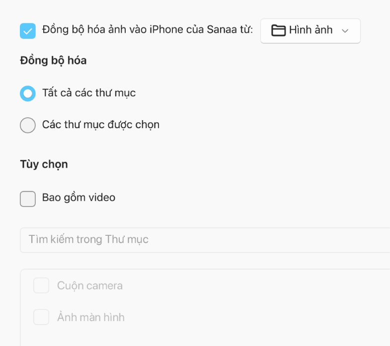 “Tất cả ảnh và album” và nút radio Album được chọn xuất hiện với các hộp kiểm “Chỉ mục ưa thích”, “Bao gồm video” và “Tự động bao gồm ảnh từ” bên dưới.
