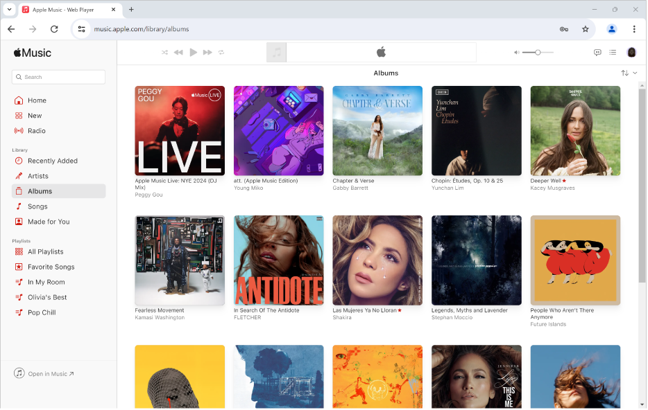 Apple Music-vinduet i Chrome med et bibliotek med flere album.