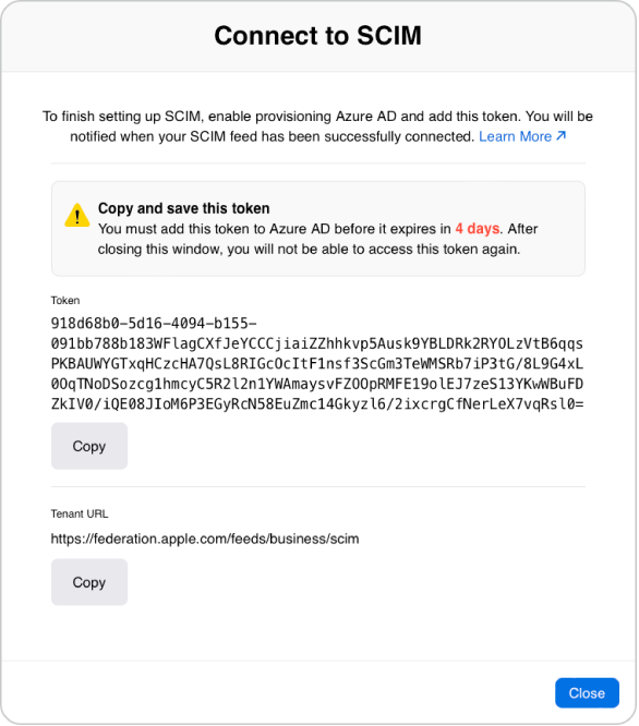 Cửa sổ Kết nối với SCIM, cung cấp một mã thông báo và một nút Sao chép ở bên dưới. Ở phía dưới bên phải là nút Đóng của cửa sổ.