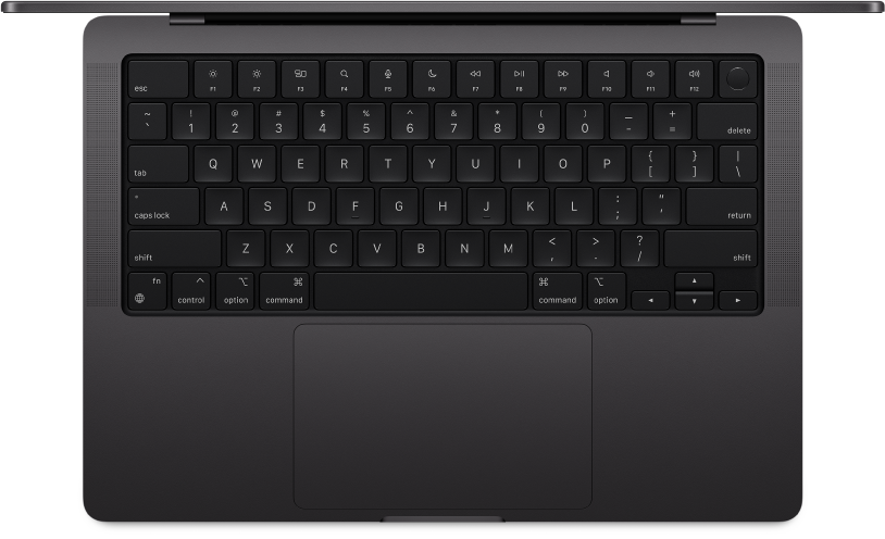 منظر جانبي لـ MacBook Pro مع الملحقات المرفقة.