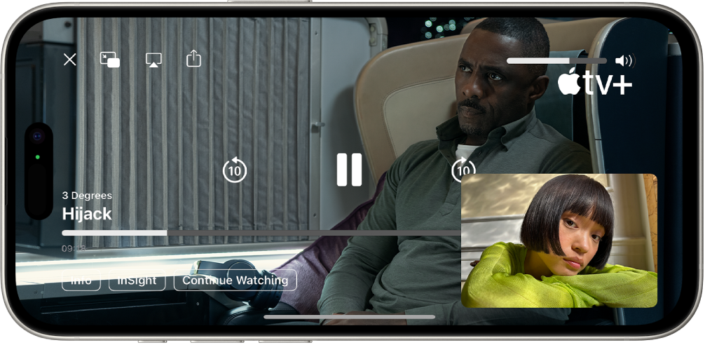 A FaceTime call with a SharePlay session, showing Apple TV+ video content being shared in the call. The person sharing the content is shown in the small window, the video fills the rest of the screen, and the playback controls are on top of the video.