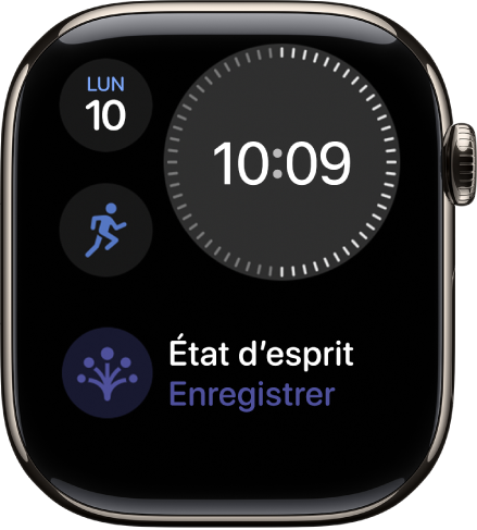 Le cadran Modulaire compact avec une horloge numérique en haut à droite, le jour et la date en haut à gauche, ainsi que deux complications : Exercice au milieu à gauche et État d’esprit en bas.