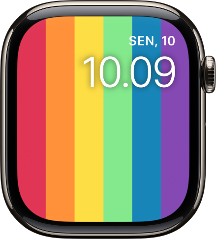 Wajah jam Pride Digital menampilkan garis pelangi vertikal dengan tanggal dan waktu di kanan atas.