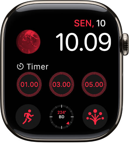 Wajah jam Modular menampilkan tanggal dan waktu di kanan atas, serta enam komplikasi: Bumi di kiri atas, Timer di tengah, dan Olahraga, Kompas, serta Kondisi Pikiran di sepanjang bagian bawah.