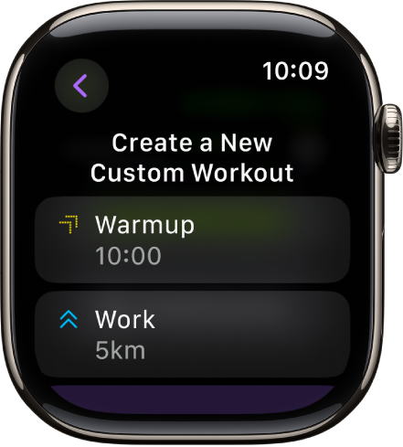 Programoje „Workout“ rodomas naujos pasirinktinės treniruotės kūrimo ekranas. Centre yra plytelė „Warmup“ su 10 minučių intervalu, o žemiau – plytelė „Work“ su 3 mylių intervalu.