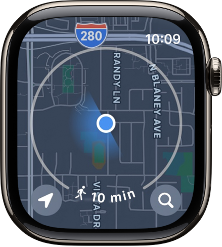App Peta dengan bulatan di sekeliling lokasi semasa, mewakili radius berjalan kaki tujuh minit. Butang Lokasi berada di bahagian kiri bawah dan butang Cari berada di bahagian kanan bawah.