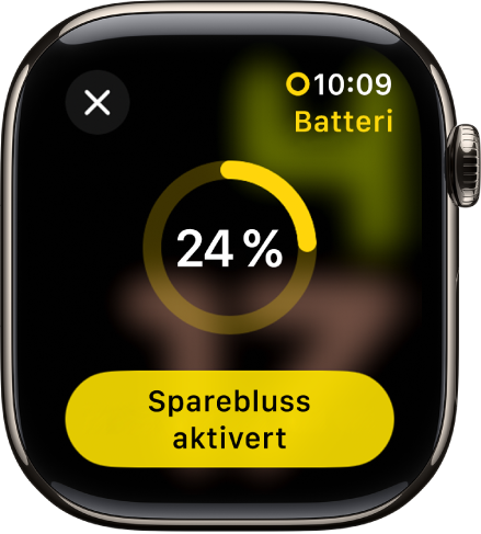 Spareblussmodus-skjermen med en delvis gul ring som indikerer gjenværende strømnivå. Spareblussmodus på-knappen vises nederst.