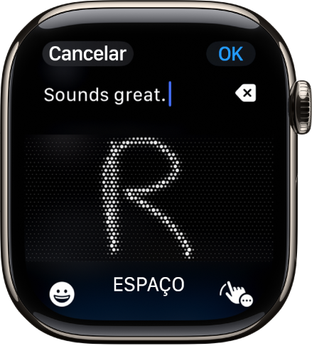 A tela do campo de texto mostrando uma letra escrita com o recurso Escrever à mão. Os botões de Emoji e Escrever à mão estão na parte inferior da tela.