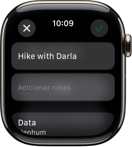 O ecrã “Editar” na aplicação Lembretes no Apple Watch. O nome do lembrete encontra-se na parte superior com uma descrição por baixo. Na parte inferior, encontra-se a data para a qual o lembrete está agendado. O botão “Verificar” encontra-se na parte superior direita. O botão “Fechar” encontra-se na parte superior esquerda.