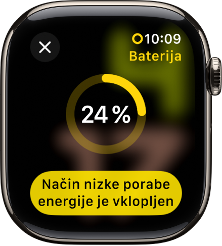 Zaslon načina nizke porabe energije z delnim rumenim obročem, ki označuje preostalo napolnjenost. Gumb za Vklop načina nizke porabe energije je na dnu.