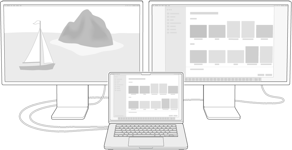 Una MacBook Air junto a dos monitores Studio Display utilizadas a modo de pantalla externa.