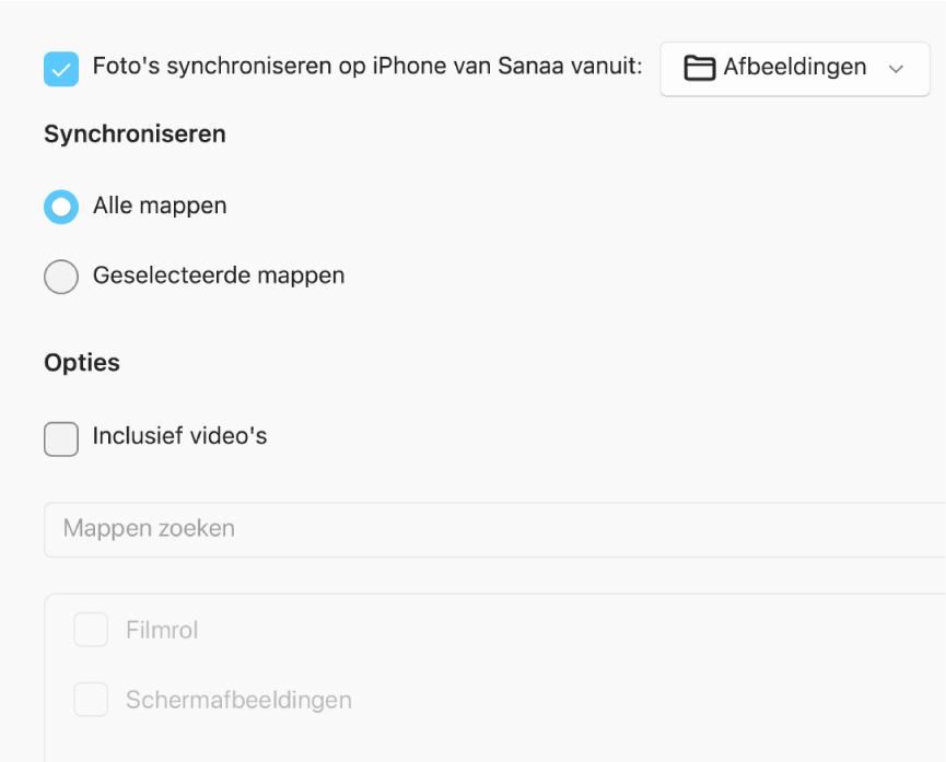 Keuzerondjes bij 'Alle foto's en albums' en 'Geselecteerde albums' zijn te zien, met daaronder de selectievakjes 'Alleen favorieten', 'Inclusief video's' en 'Automatisch inclusief foto's van'.