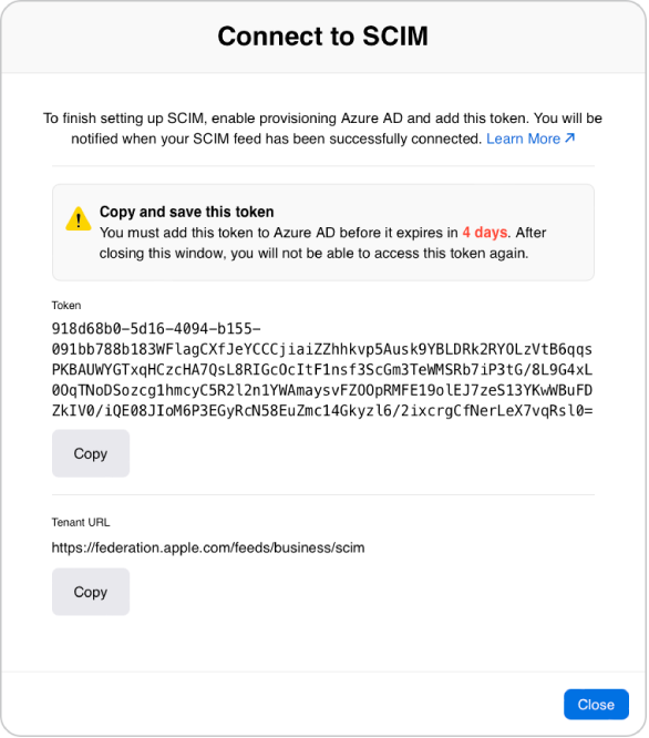 “Connect to SCIM”窗口，其中提供了令牌，令牌下方有“拷贝”按钮。窗口的右下方有“关闭”按钮。