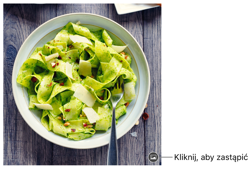 Obrazek z przyciskiem zastępowania obrazka.