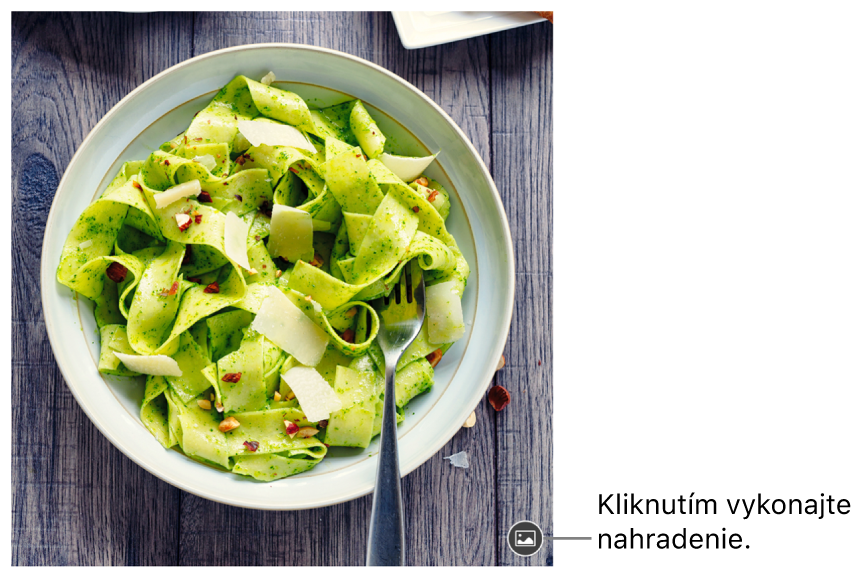 Obrázok s tlačidlom Nahradiť obrázok.