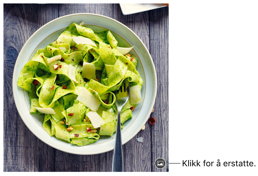 Et bilde med en Erstatt bilde-knapp.