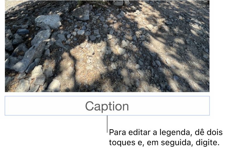 O marcador de posição de legenda, “Legenda”, aparece sob a fotografia; um contorno azul em redor do campo de legenda para mostrar que está selecionado.