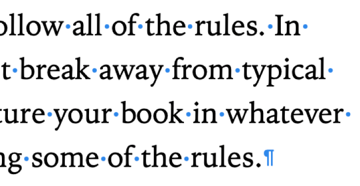 Text afișând simboluri pentru spații, o întrerupere de paragraf și de secțiune.