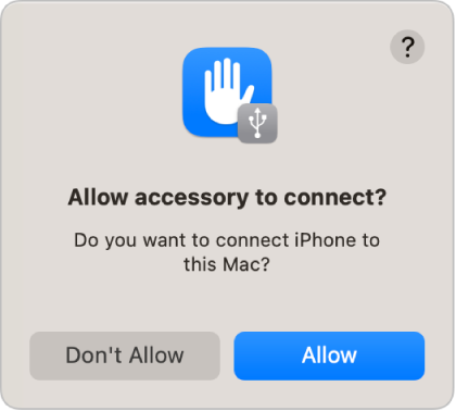 مربع حوار يطلب من المستخدم اختيار ما إذا يتم توصيل iPhone بـ Mac.