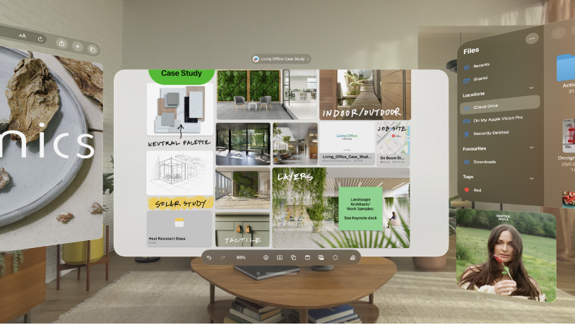 Multiple apps open on Apple Vision Pro, arranged in front of and around the user.