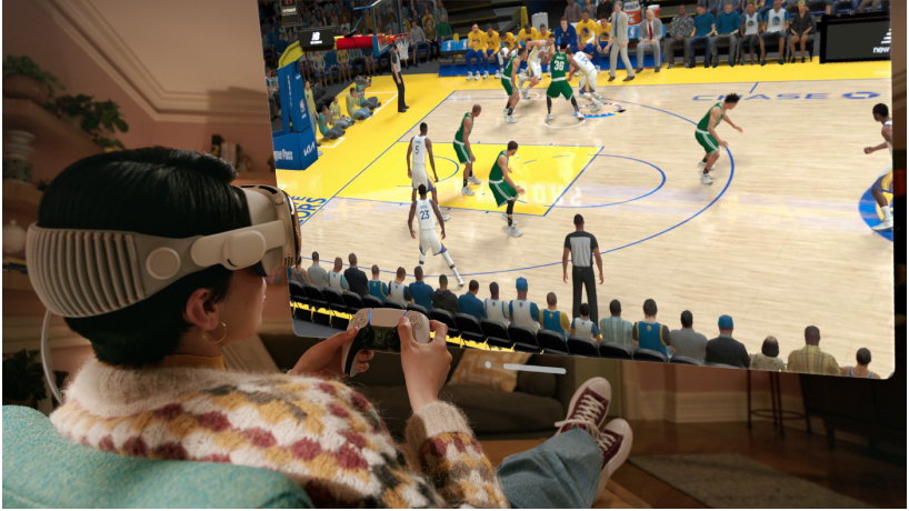 A person playing a game in Apple Arcade on Apple Vision Pro, using a connected controller.