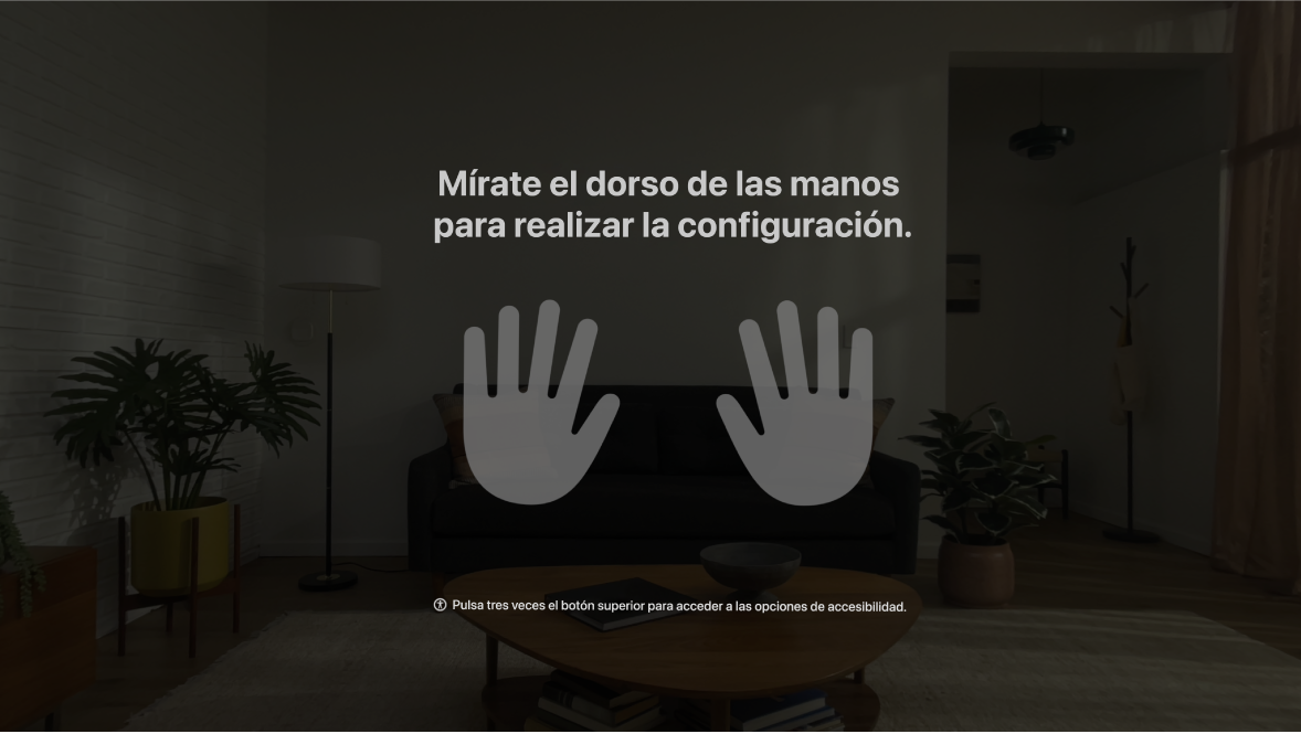 La configuración de las manos en el Apple Vision Pro está indicando al usuario que mire las manos colocándolas delante.