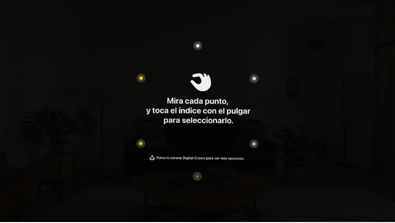 Vista de la configuración ocular con instrucciones para mirar cada punto y pellizca con dos dedos para seleccionarlo. También hay instrucciones para pulsar la corona Digital Crown para ver más opciones.