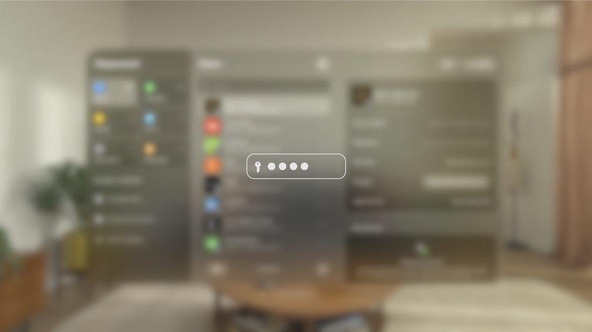 La vista su Apple Vision Pro mentre viene inserita una password, vista da una persona che guarda su uno schermo duplicato. La vista è sfocata e un’immagine indica che l’utente sta inserendo una password.
