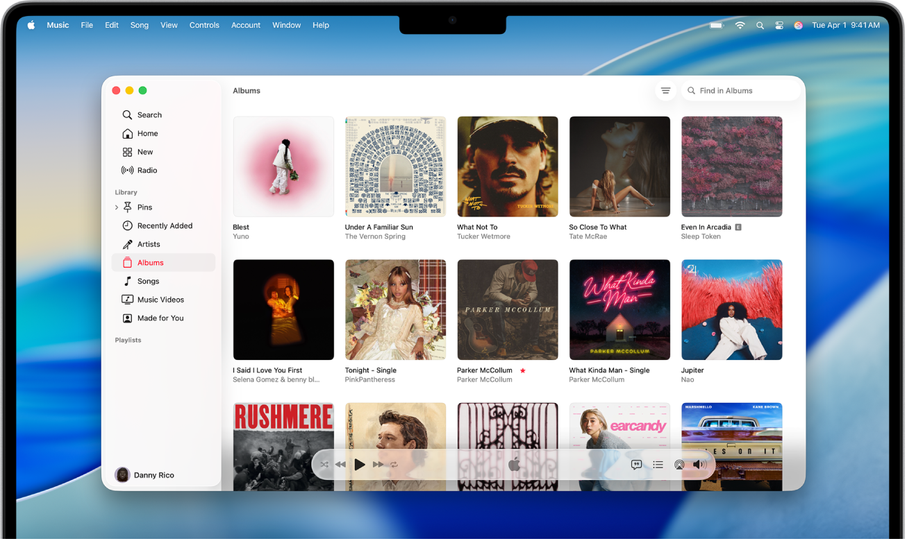 The Apple Music window with a library of albums.