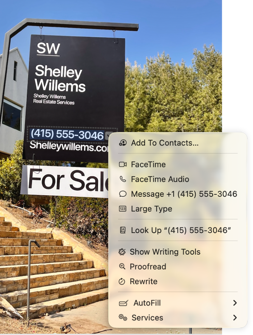 A photo of a real estate For Sale sign showing the agent’s phone number selected as Live Text and a menu presenting options to add the phone number to Contacts, call the number, start a FaceTime call, send a text message, and more.