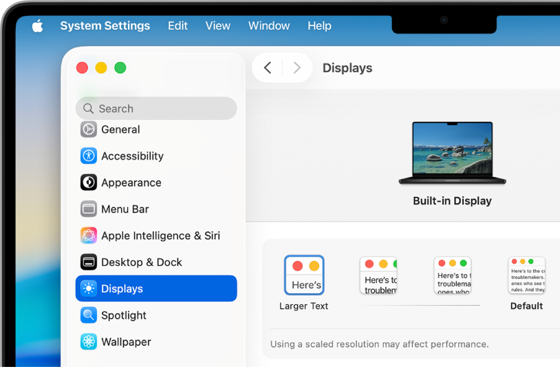 The System Settings window is open on the desktop. The display is using a lower resolution so user interface elements appear larger.