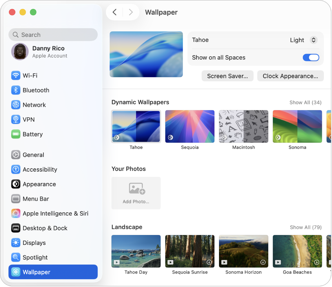 The System Settings window, with Wallpaper settings selected in the sidebar, and Tahoe Dynamic Wallpaper (Light) selected on the right.