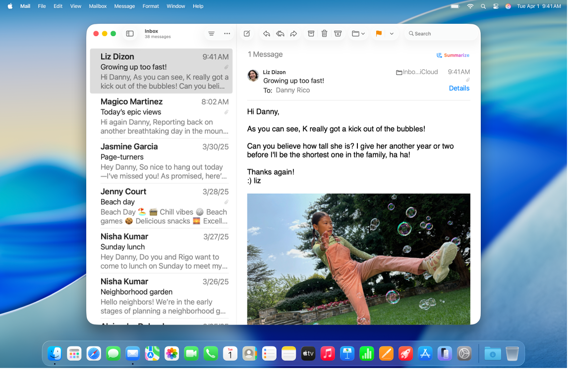 The Mail window is open on the desktop. Emails are displayed with large text.
