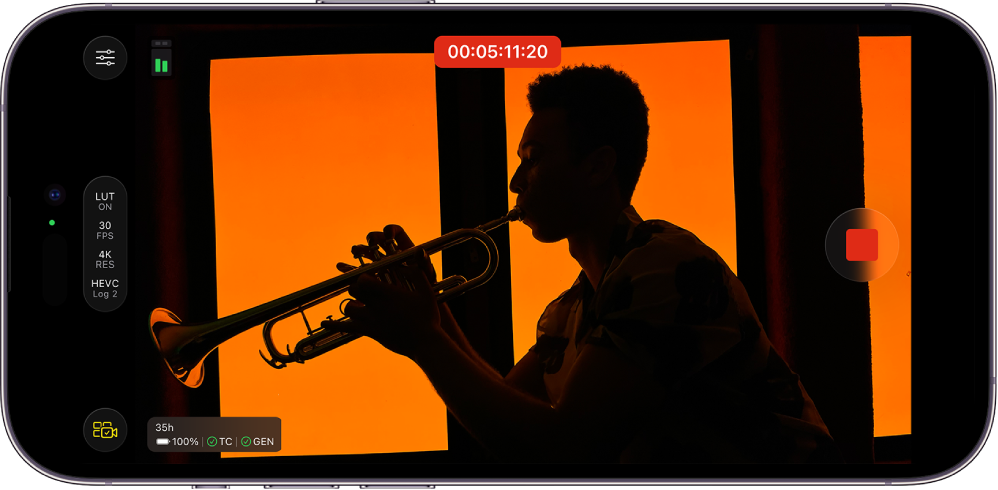 Pantalla de Final Cut Camera con los controles de cámara, una visualización de código de tiempo y el botón Pausar.