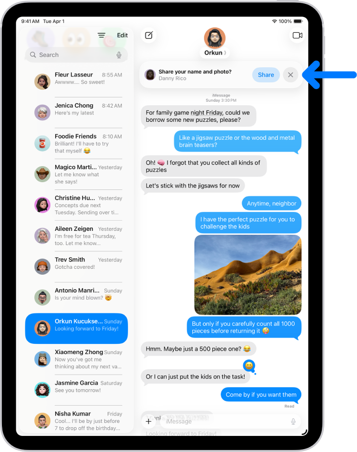 A conversation in Messages. A notification appears at the top asking whether the user’s name and photo should be shared with the other person in the conversation.