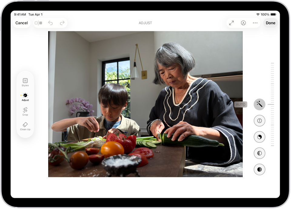The Edit screen of the Photos app showing a photo in the center. To the left of the photo are the Adjust, Filters, and Crop buttons; Adjust is selected. To the right of the photo are buttons for editing effects and a slider to adjust each effect level.