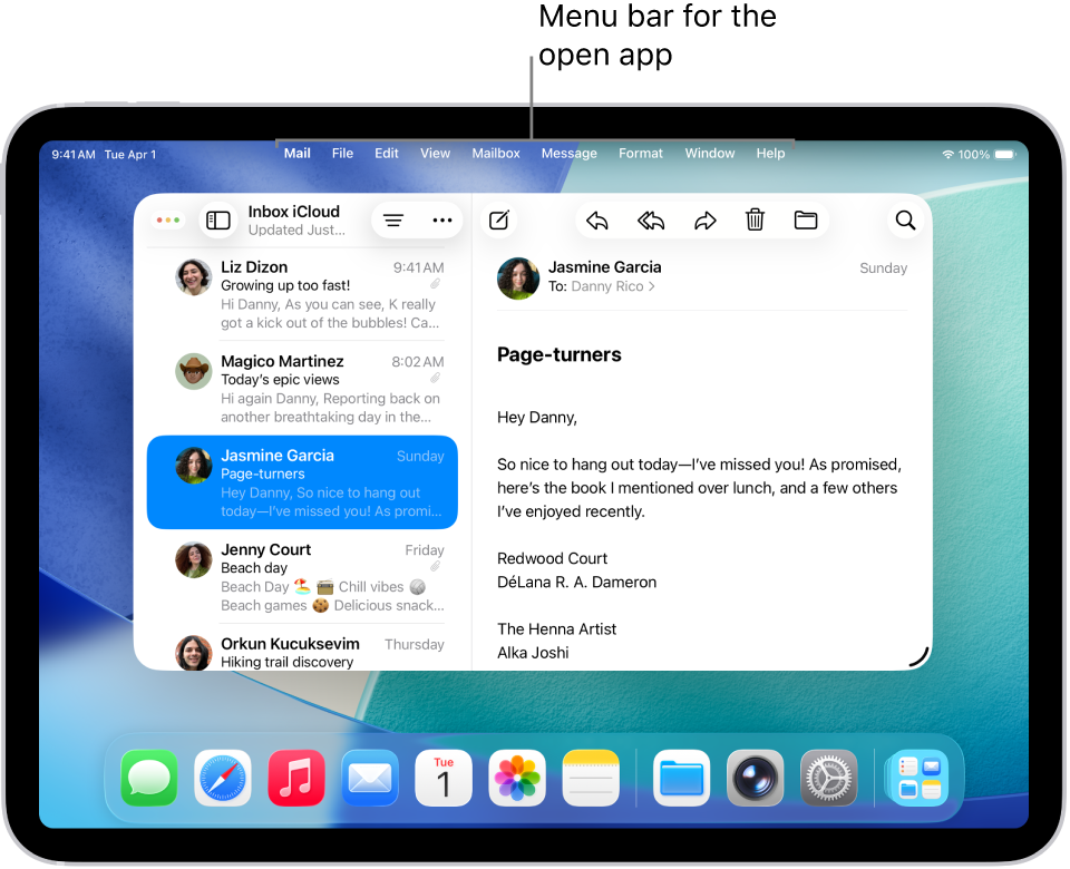 The mail app open on the iPad screen, with the menu bar showing at the top of the screen.