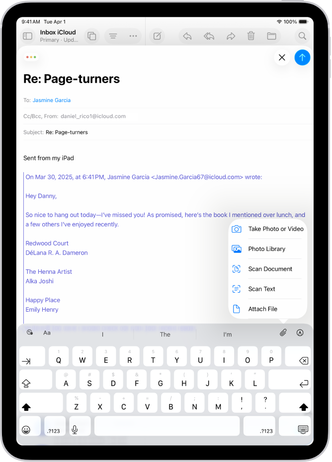 A draft email being composed with the attachment options above the keyboard.