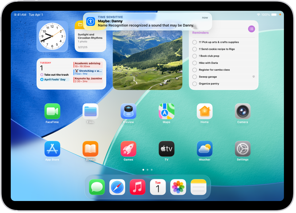 iPad wyświetlający powiadomienie, że funkcja Rozpoznawanie imienia rozpoznała dźwięk, który brzmi jak imię.